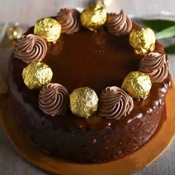 Order Blissful Care carnation & Ferrero Rocher cake online | free delivery  in 3 hours - Flowera